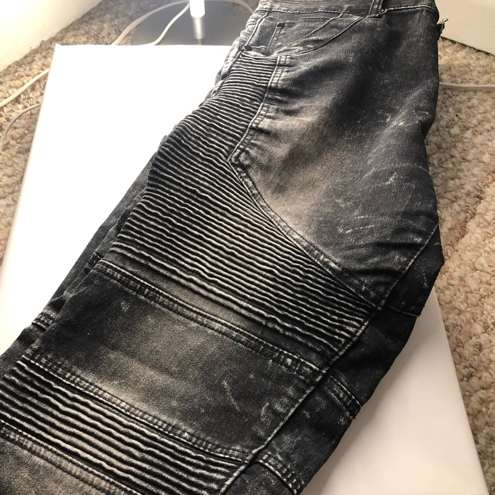Faded black jeans with ridges